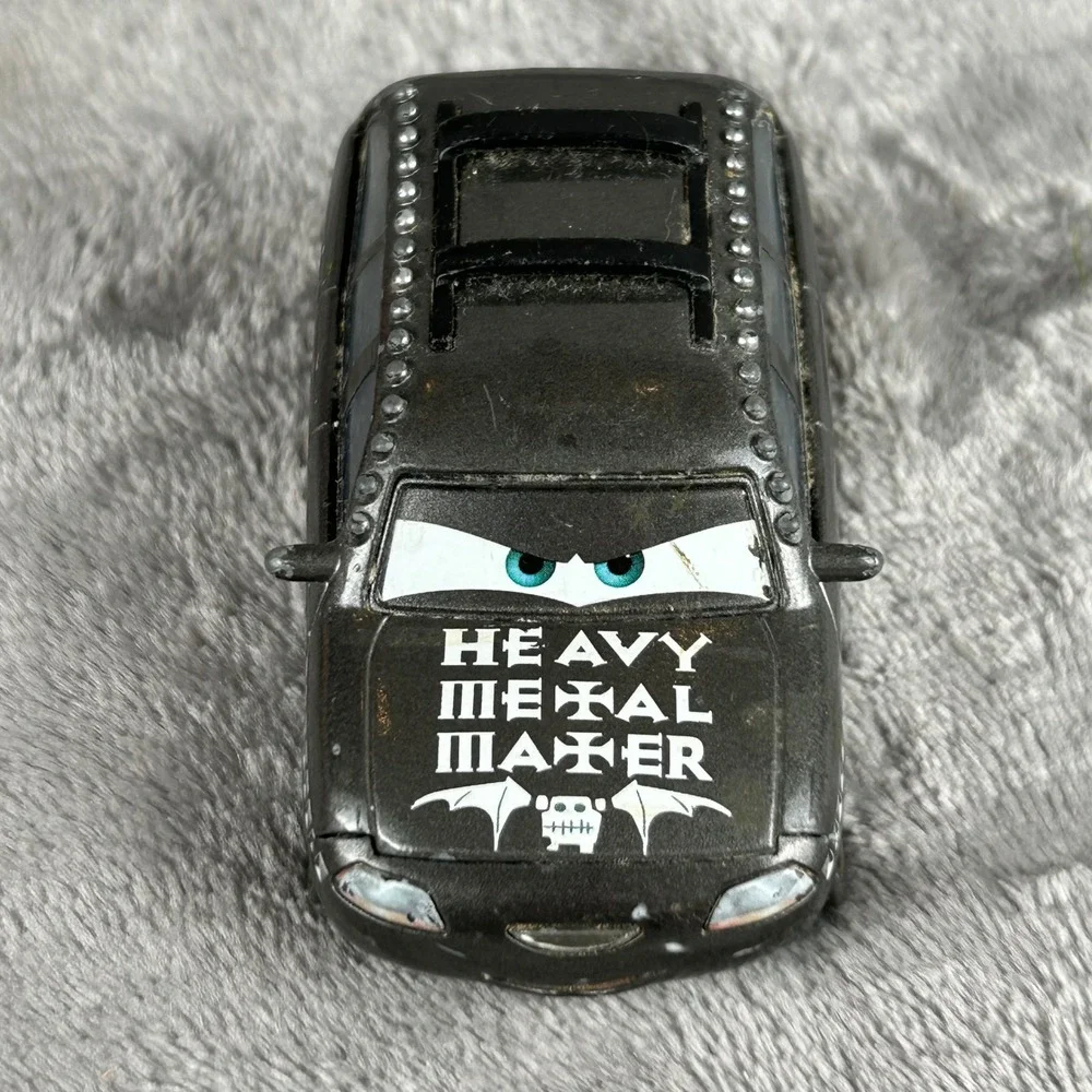 Disney Pixar Cars Heavy Metal Mater Diecast Rocking Rodney Minivan Black Studded